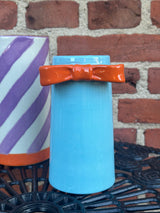 Vase med sløjfe