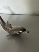 Oplukker ~ delfin