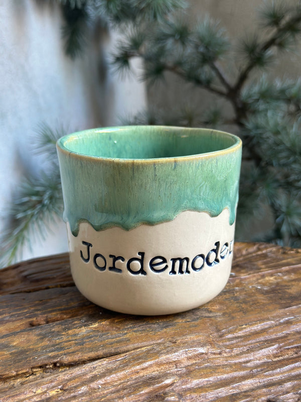 Kop ~ Jordemoder