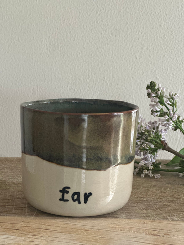 Kop ~ far