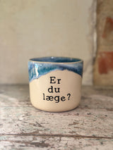 Kop ~ er du læge?