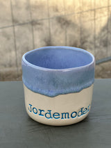 Kop ~ Jordemoder